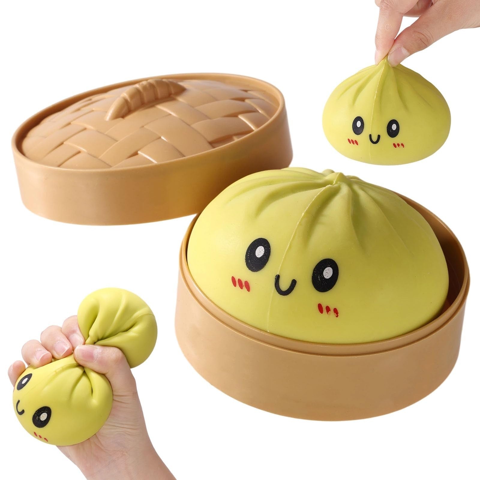 A novelty steamer-shaped toy or kitchen prop made from a yellow dumpling-like shape with a cartoon face, shown with a tan basket-style lid and a tan base. Human hands are visible holding and pressing parts of the item, so this is classified as Lifestyle rather than Product/Packaging.